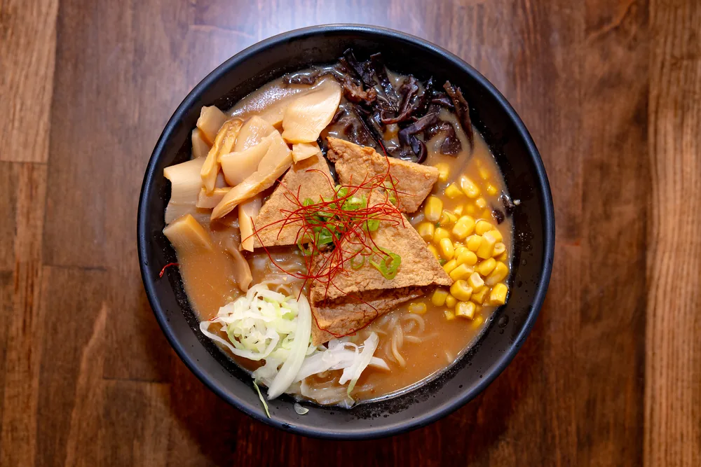 Vegetarian ramen with fried tofu, corn, bamboo, wood ear mushroom and chili threads